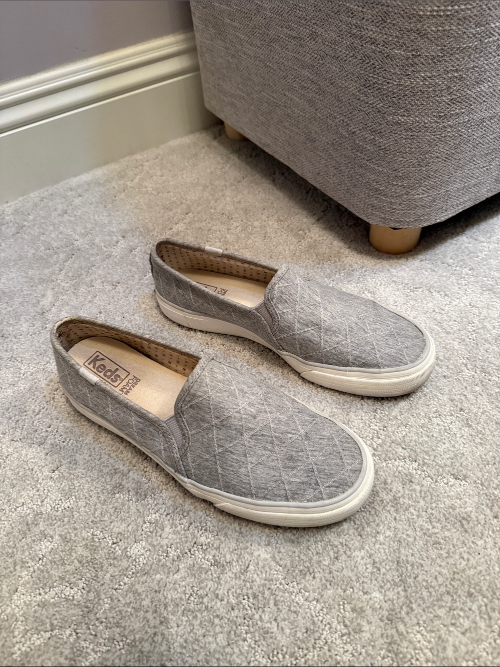 Keds women’s Grey Quilted Slip-On Sneakers